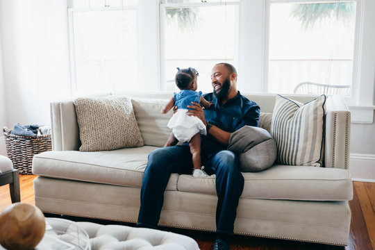 Father and daughter playing together