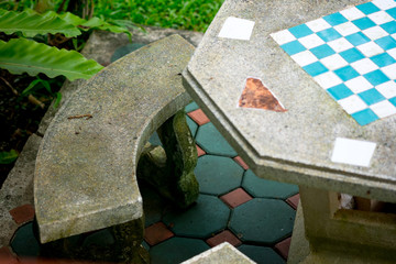 Set of stone table with chess checker-board