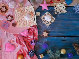  Sweet dessert on a plate, festive decor, hearts, fir branches on a wooden table, top view, Valentines day, Christmas, seasonal winter holidays