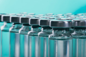 Glass medical ampoule vial for injection. Medicine is liquid sodium chloride with of aqueous...