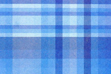 A close up color image of blue plaid card used in crafting.