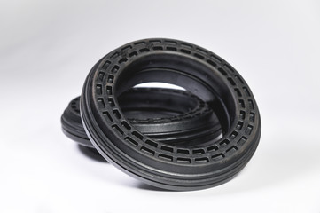 A pair of new thrust bearings absorber car on a gray background. The concept of new car parts and car service