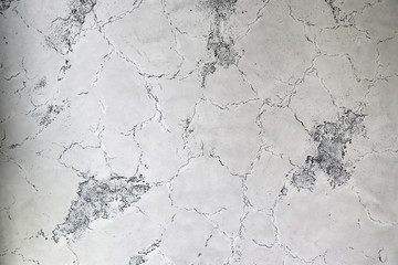 background old concrete wall with remnants of plaster with copy space for text or image