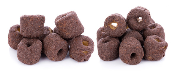 Crunchy corn chocolate snacks on a white background