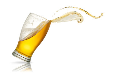 Beer splash in glass isolated on white