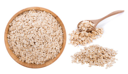 Oat flakes pile isolated on white background
