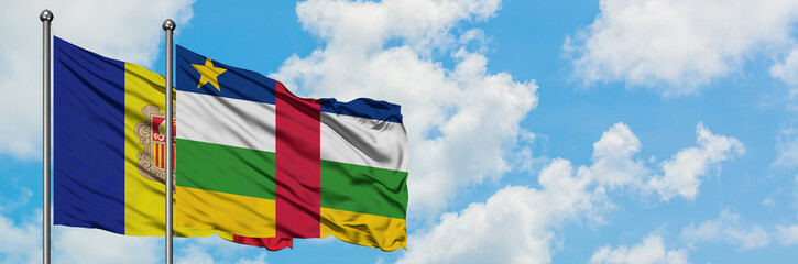 Andorra and Central African Republic flag waving in the wind against white cloudy blue sky together. Diplomacy concept, international relations.
