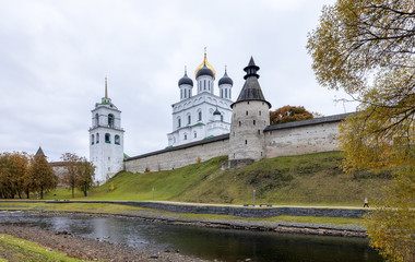 Fototapeta na wymiar Pskov in October. The banks of the Pskova river and the Pskov Kremlin. Trinity cathedral, Pskov, Russia