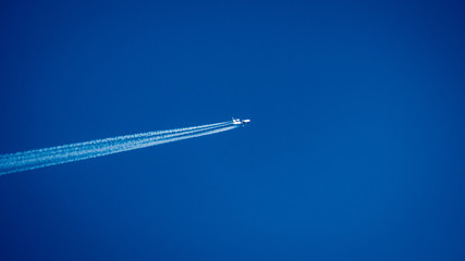 Plane on blue sky