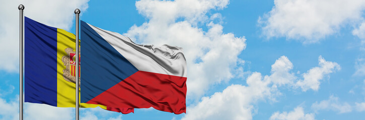 Fototapeta na wymiar Andorra and Czech Republic flag waving in the wind against white cloudy blue sky together. Diplomacy concept, international relations.
