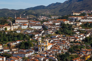 Fototapeta na wymiar Beautiful city with colonial Portuguese architecture and churches in Brazil. Capital of the state of Minas Gerais designated a World Heritage site by UNESCO. Ouro Preto, Brazil