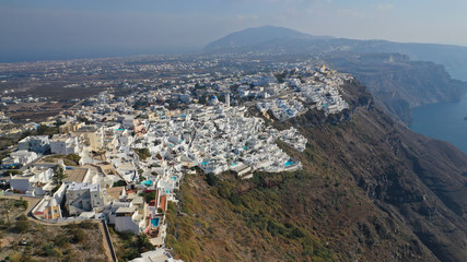 Aerial drone photo of famous church of Agios Nikolaos in Firostefani area with beautiful view to Caldera, Santorini island, Cyclades, Greece