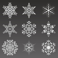Naklejka na ściany i meble Snowflakes collection isolated on black background. Flat snow icons, silhouette. Element for Christmas banner or New year theme. Winter illustration symbol.