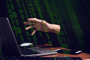 hacker hand and coding ai computer binary digital network server closeup on screen monitor with pixel, depth of field focus, data processing online internet system grid concept