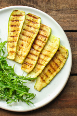 grilled zucchini (fried vegetables and salad, main course, healthy food) menu concept. food background. copy space. Top view
