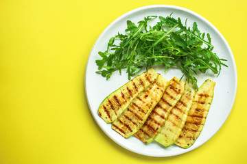 grilled zucchini (fried vegetables and salad, main course, healthy food) menu concept. food background. copy space. Top view