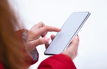Woman using mobile smartphone with blank screen