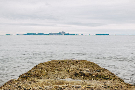 Scenic view of sea against cloudy sky