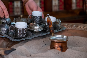 Turkish coffee is cooked in the sand.traditional turkish coffee. Sirince, izmir , Turkey