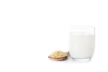 Rice milk in glass isolated on white background. Copy space