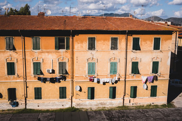 Washing lines from apartments in Italy