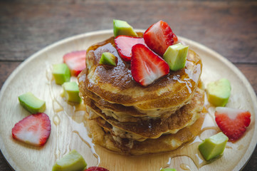 pancake strawberry avocado fruit and honey syrup sweet dessert on wood table pan cake dessert homemade
