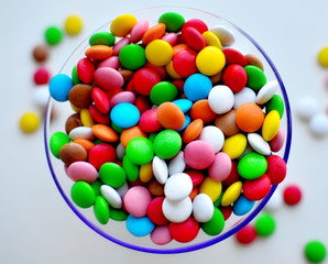 colorful candies on white background