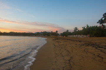 sunset at the sea in domentican republic