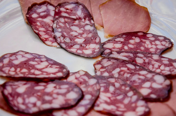 tasty sausage on a plate, close-up.