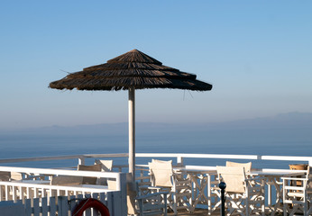 Greece - Folegandros island:  Shade at a terrace overlooking the Aegran sea.