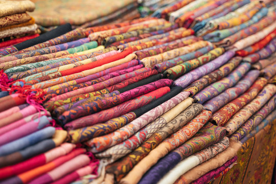 Traditional Indian fabric store. Colorful traditional indian textile fabric wrap scarfs