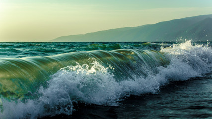 waves crashing on rocks
