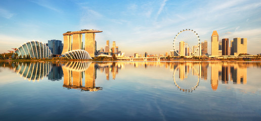 Singapore city skyline panorama at sunrise