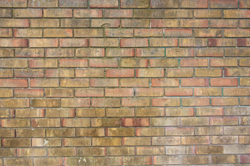 Background of brick wall texture. Old grunge outdoor orange stone texture, english brick wall.