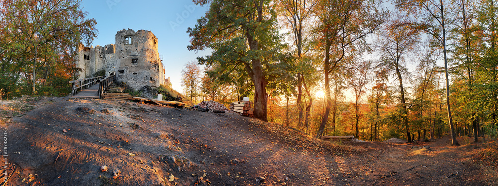 Canvas Prints Panorama of autumn forest with Uhrovec castle in Slovakia at sunset