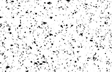 Small uneven spots and particles of debris. Abstract vector texture.  Distressed uneven background. Grunge texture overlay with fine grains isolated on white background. Vector illustration. EPS10.