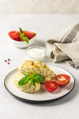 Healthy cabbage rolls with vegetables and sour cream sauce. Selective focus, space for text.