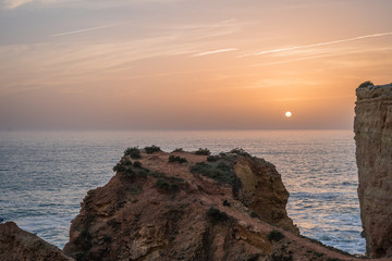 Views of the Atlantic Ocean with a sunset in Carvoeiro