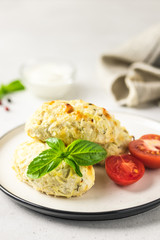 Healthy cabbage rolls with vegetables and sour cream sauce. Selective focus, space for text.