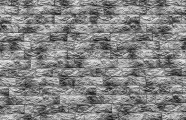 black and white brick wall background , rough bricks vintage texture ,wallpaper of old street