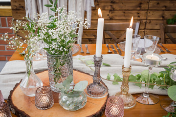 Rustic decoration from natural things for a perfect wedding reception. Boho party. Elegant catering.
