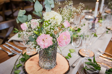 Rustic decoration from natural things for a perfect wedding reception. Boho party. Elegant catering.