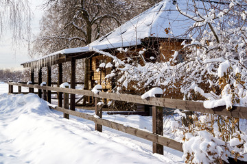 Winter house on winter snowy panoramic landscape