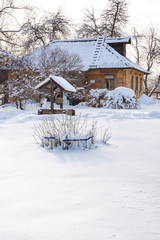 Winter house on winter snowy panoramic landscape