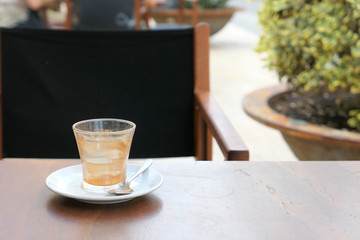 Empty coffee cup on cafe table in Ciutadella