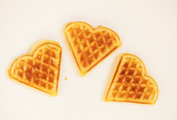 Heart shaped cookies. Viennese waffles on a white background