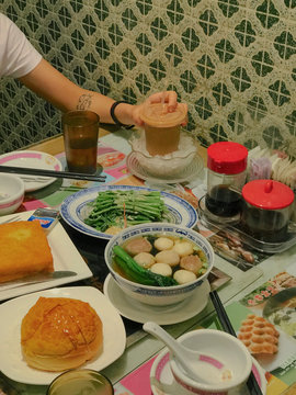 Overhead view of Chinese food on dinner table