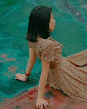 High angle view of young woman relaxing on the floor