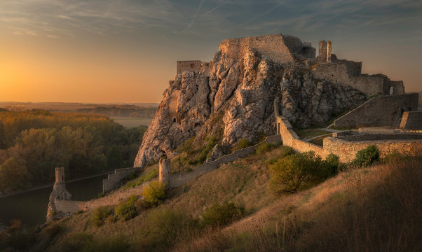 Golden color of Devin castle during the sunset, Slovakia.