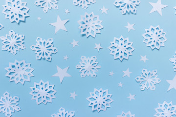 Paper pattern with snowflakes and stars